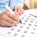 writing hand calendar pen dates 7702615